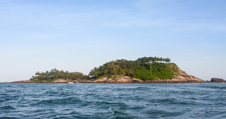 Fototapeta na wymiar A small tropical island off the coast of Guaruja