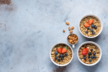 Tasty Strawberry Dessert, Homemade Granola with Strawberries, blueberries, raspberries and red currants. Seeds, Healthy Breakfast, Parfait in a Jar over Bright Background