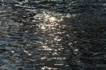 Fototapeta premium Rapidly flowing river with reflections