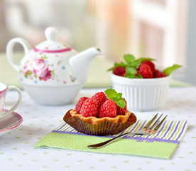 mini tarts with raspberries fruits