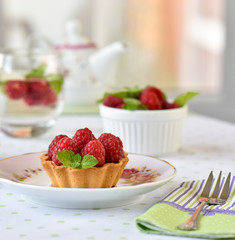 mini tarts with raspberries fruits