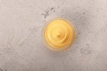 cheese sauce in a glass dish