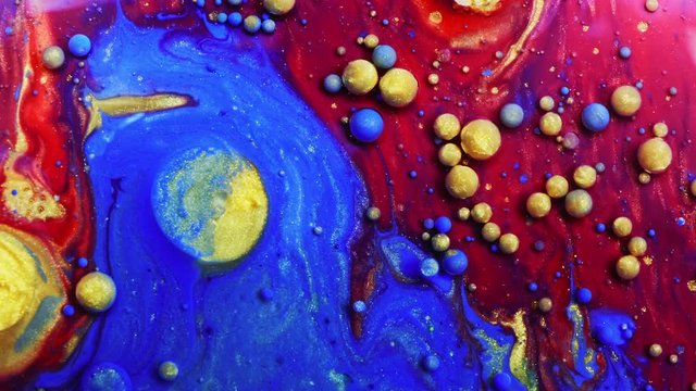 Multicolored Bubbles Of Bright Collors Moving In Paint Oil Surface Beautiful Blue Universe Of Color Slow Motion Macro Red Blue Black And Yellow