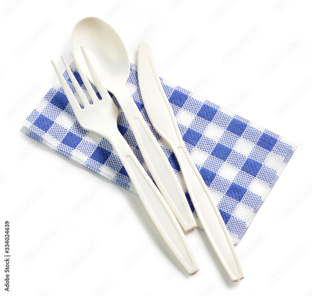 Sticker white take away spoon and fork on paper napkin