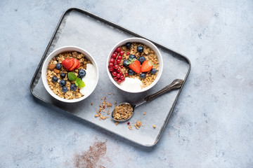 Tasty Strawberry Dessert, Homemade Granola with Strawberries, blueberries, raspberries and red currants. Seeds, Healthy Breakfast, Parfait in a Jar over Bright Background