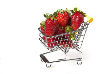 Fresh sweet Strawberries in Shopping Cart, Isolated on White Background. Close - up. organic...