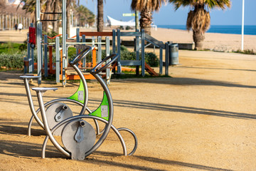 Fitness equipment on the beach - 334027671