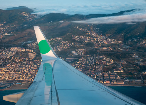We are approaching Barcelona airport from the air.