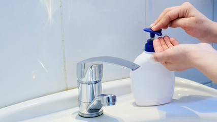 Woman washing hands