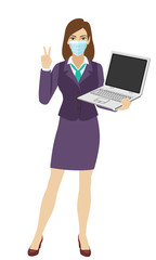 Businesswoman with medical mask holding a laptop notebook and showing victory sign. Two finger up. Full length portrait of businesswoman in a flat style.