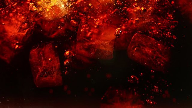 Super slow motion of pouring cola drink with ice cubes inside. Filmed on high speed cinema camera, 1000 fps.