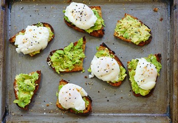 Making Multigrain avocado toast with fried egg on top