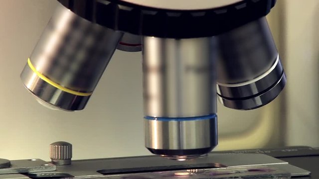 Optical elements of a microscope close-up.