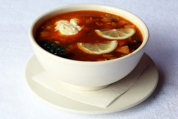 Combined hodgepodge soup with sour cream, dishes of Russian national cuisine