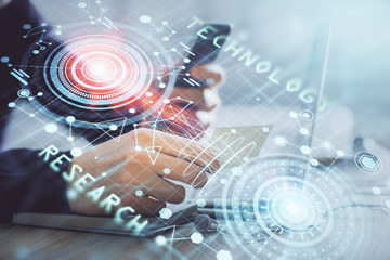 Multi exposure of man's hands holding and using a digital device and data theme drawing. Innovation...