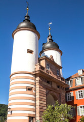 Obraz premium Heidelberg, Germany - Carl Theodore bridge with iconic twin towers and gate. German Tourist Destination.