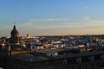 Naklejka premium Seville city view at sundown from top of the Metropol Parasol (Setas de Sevilla) building.