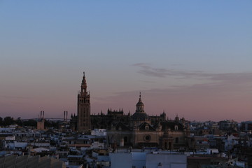 Obraz premium Seville city view at sundown from top of the Metropol Parasol (Setas de Sevilla) building.