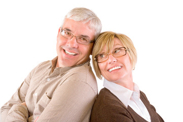 A happy attractive couple in their late 40's isolated on white.