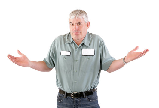 A confused adult male serviceman worker with blank name tag on shirt with his arms out.