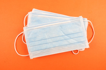 Flu prevention concept. Top view of medical face mask and copy space