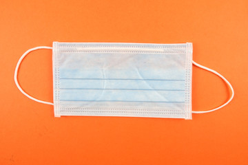 Flu prevention concept. Top view of medical face mask and copy space