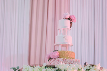 Multilayered Wedding cake decorated with flowers
