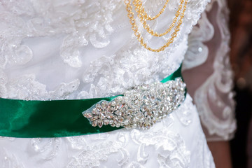 Muslim wedding ceremony sacred bridal belt close up