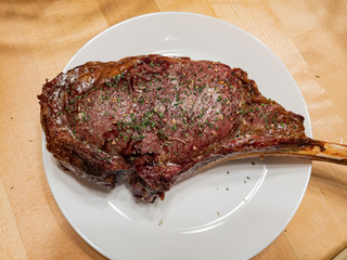Close up shot of a grilled Tomahawk steak