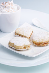 cookies and alfajores with sour cream and jam