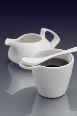 white cup of coffee and cream