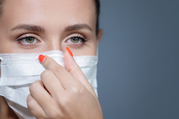 Woman in medical mask. Coronavirus. Covid-19. 2019-ncov.