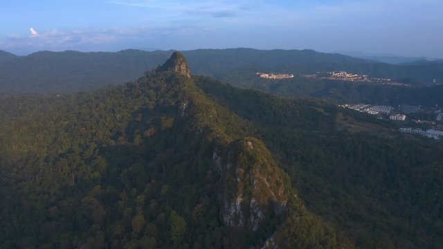 4k Scenic Aerial View of Bukit Tabur Quartz Ridge revealing mountain background and blue sky