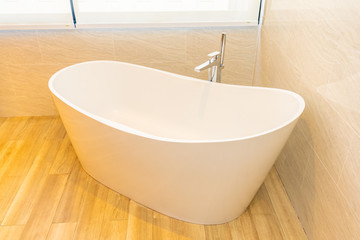 Clean white empty bathtub decoration interior