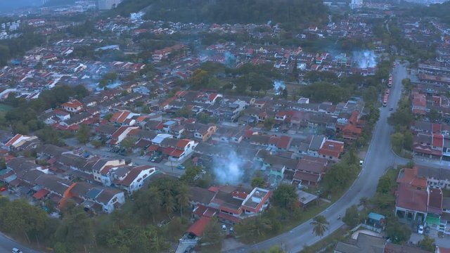 4k Aerial View of Fogging Activities at late afternoon in residential area. Fly by Shot