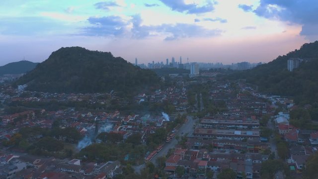 4k Aerial View of Fogging Activities at late afternoon in residential area. Moving Forward Shot