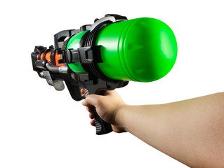 Isolated hand holding water gun.