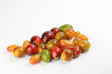 Fresh ripe mixed tomato verity assorted color on white background