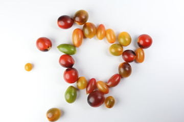 Fresh ripe mixed tomato verity assorted color on white background