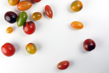 Fresh ripe mixed tomato verity assorted color on white background