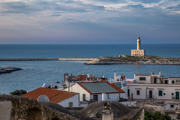 View from city to lighthouse and sea