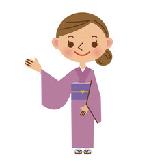 お客様に案内をする旅館の女将さん