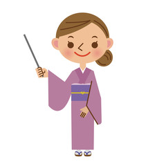 差し棒を使いお客様に説明をする旅館の女将さん