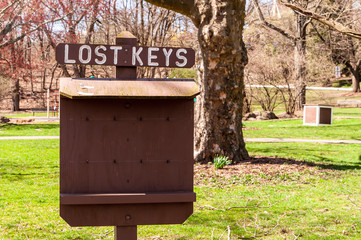  A Lost Keys wooden board in Frick Park on a sunny winter day, Pittsburgh, Pennsylvania, USA
