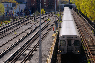 TTC subway train exiting Keele station on the Toronto Bloor line with switching tracks