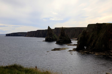 Naklejka na ściany i meble Duncansby (Scotland), UK - August 03, 2018: The Duncansby stacks, duncansby head, Scotland, Highlands, United Kingdom
