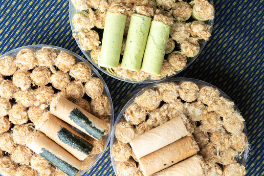 Thai Dessert, Thai crispy coconut roll with dried shredded pork inside - Powered by Adobe