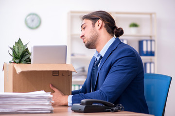 Young man being fired from his work