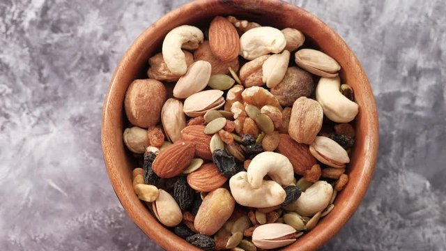 closeup organic mixed nuts with rotation,.