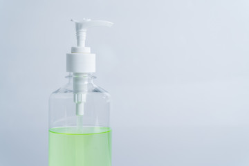 Pressed hand sanitizer on white background.